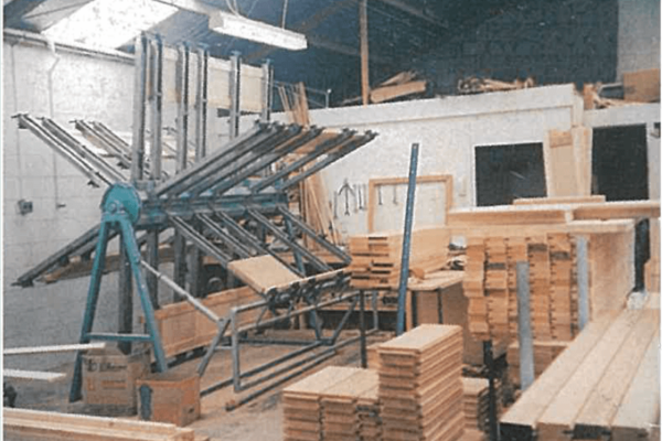 The timber panels are glued on a specialist rotating cramping press